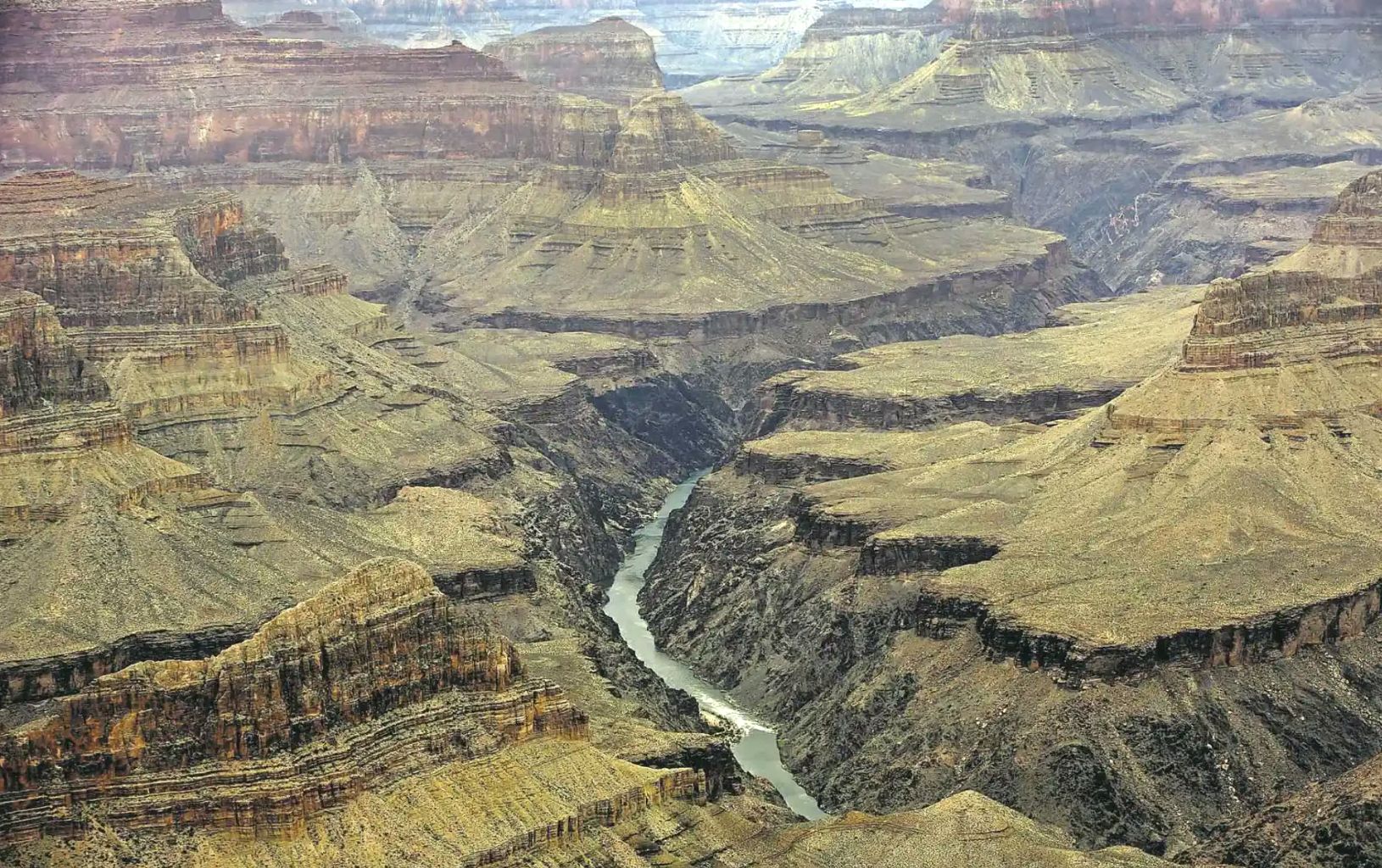 The Colorado River flows through the Grand Canyon. The town of Tusayan, Ariz., has proposed adding commercial development near the canyon that is being fought by the National Park Service.